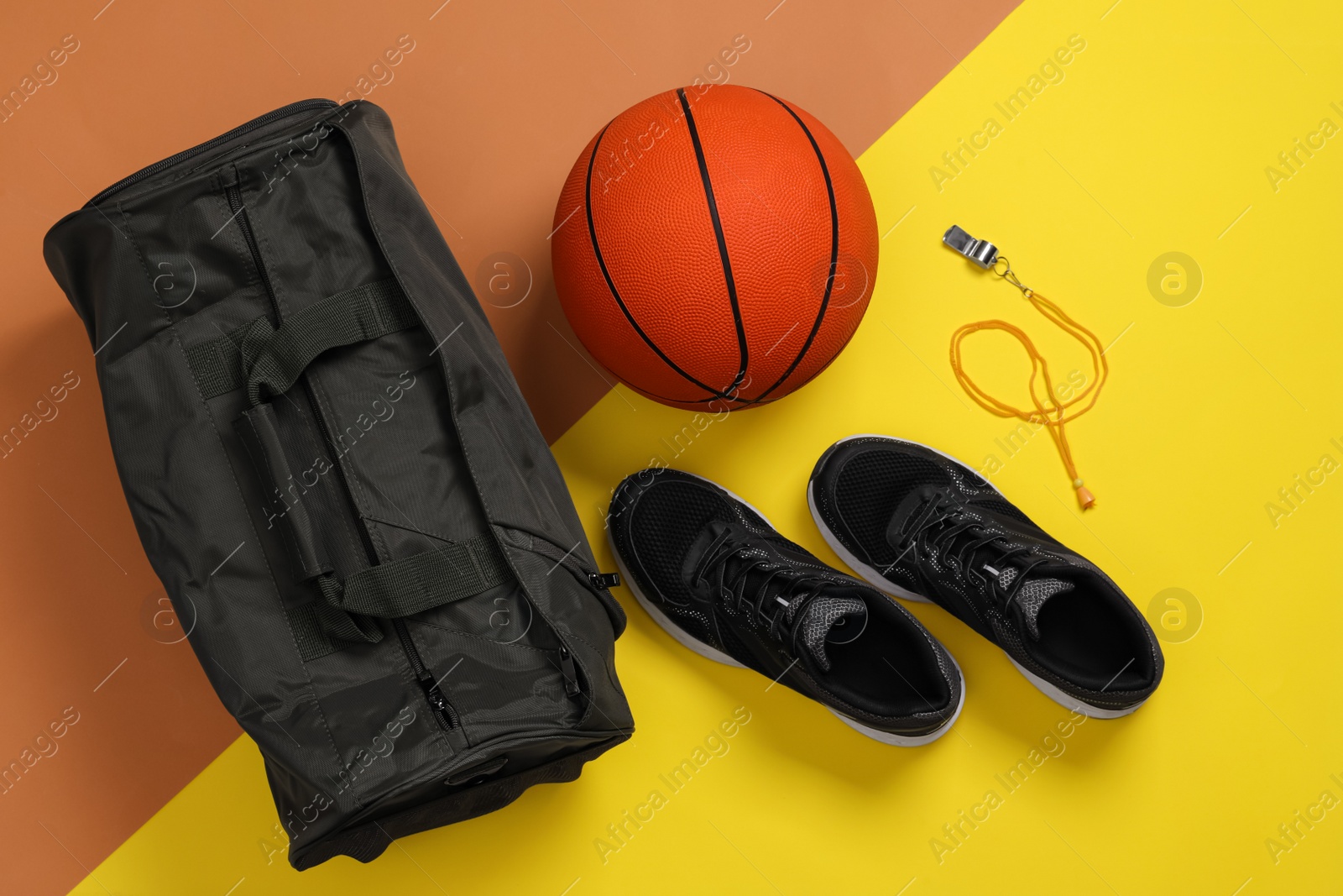 Photo of Gym bag and sports equipment on color background, flat lay