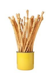 Delicious grissini sticks in cup on white background