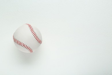 Photo of Baseball ball on white background, top view with space for text. Sports game