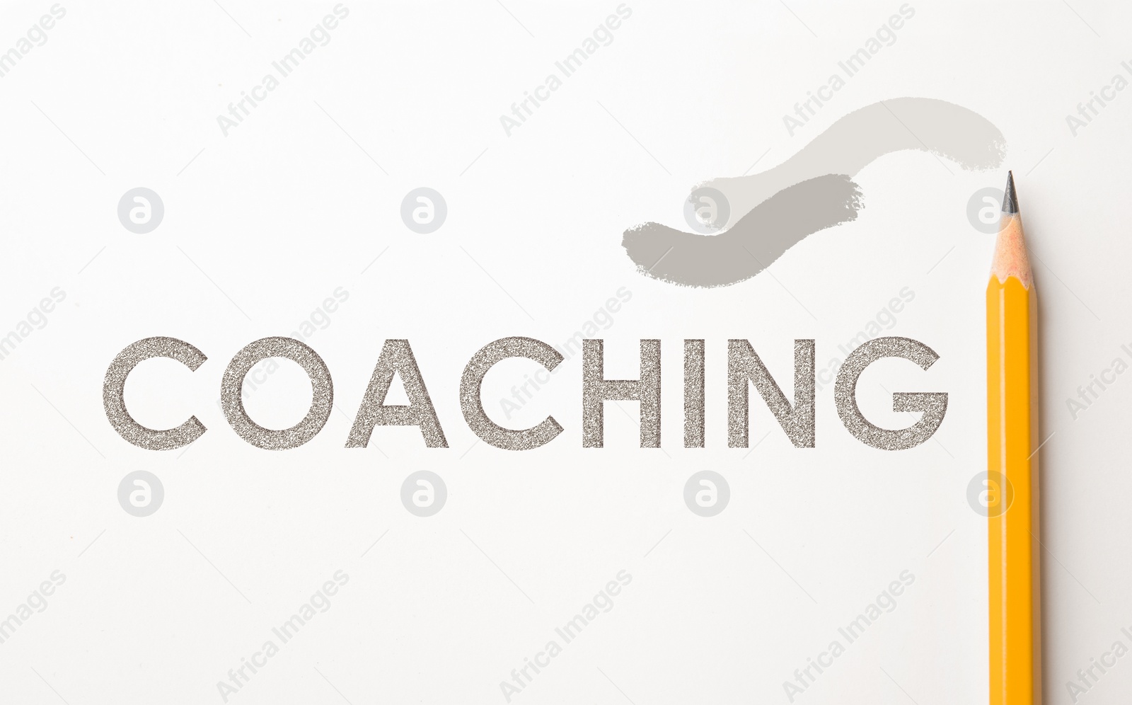 Image of Adult learning. Sharp pencil and word COACHING on white background, top view