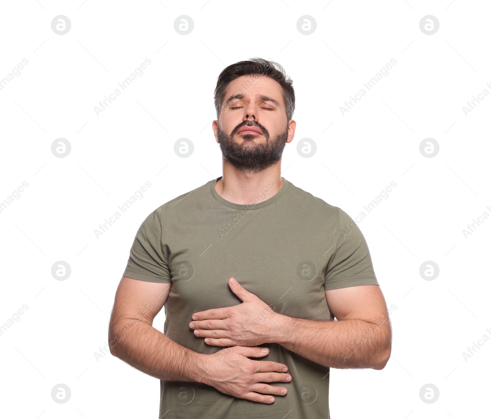 Photo of Man suffering from stomach pain on white background