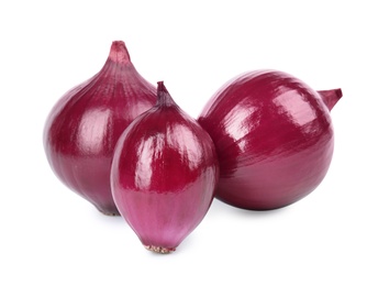 Fresh whole red onions on white background