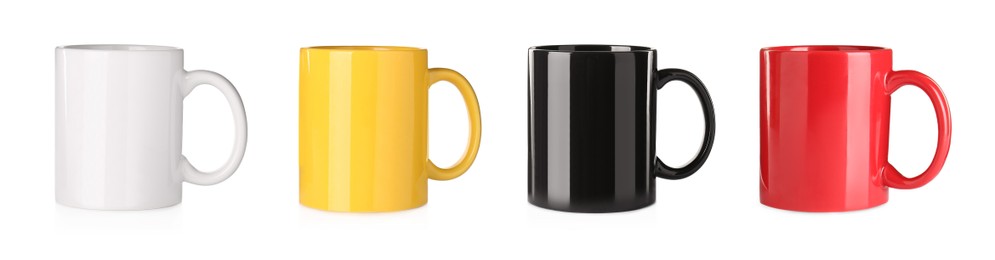 Set with different ceramic mugs on white background. Banner design