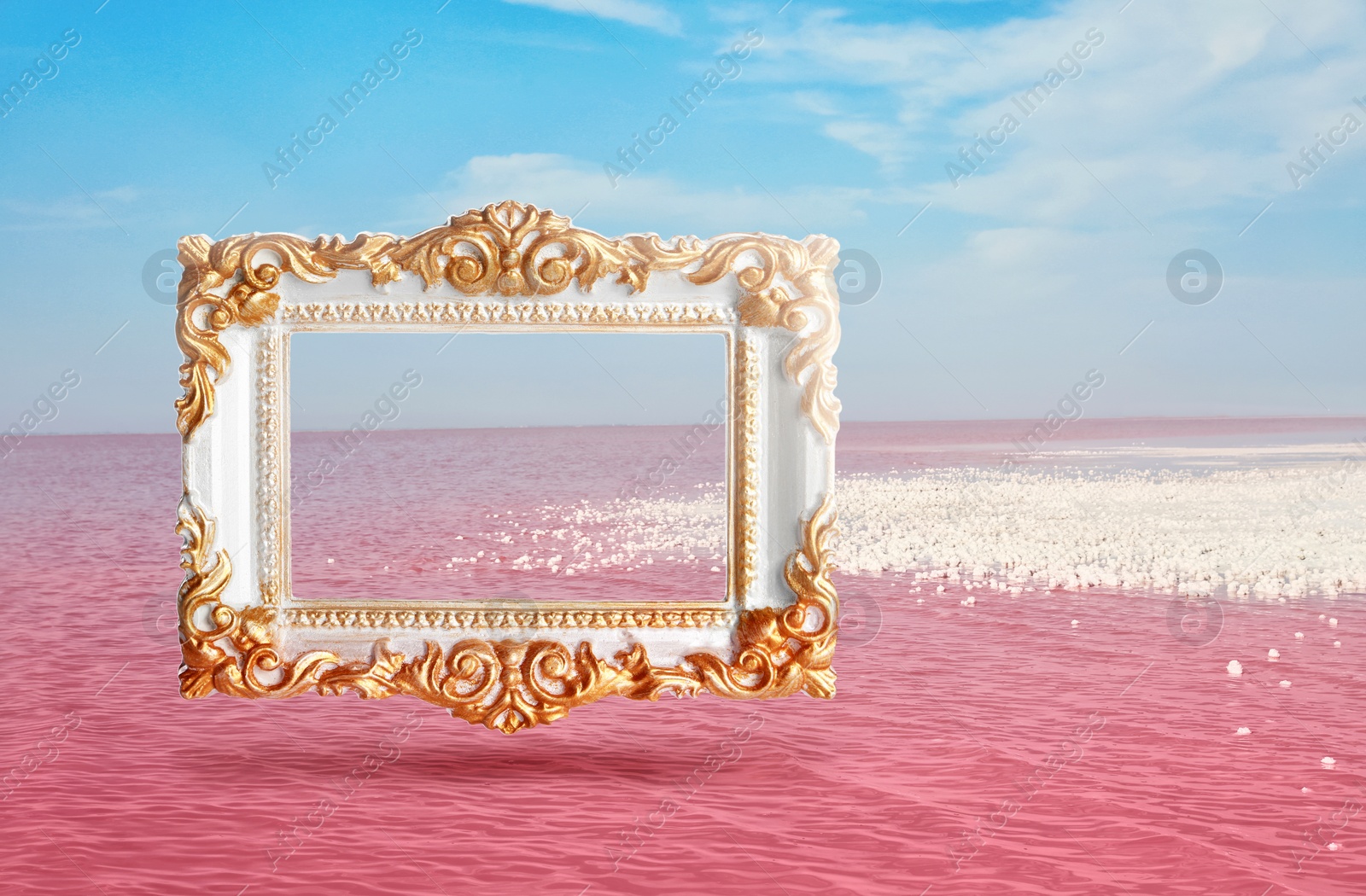 Image of Vintage frame and beautiful pink lake under blue sky with clouds