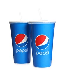 MYKOLAIV, UKRAINE - JUNE 9, 2021: Paper Pepsi cups with straws isolated on white