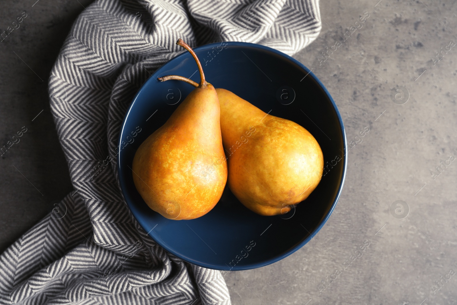 Photo of Flat lay composition with ripe pears on grey background