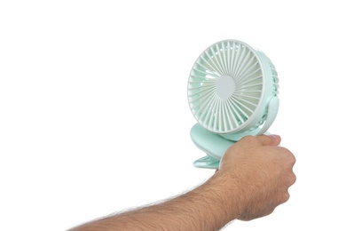 Photo of Man with portable fan on white background, closeup. Summer heat