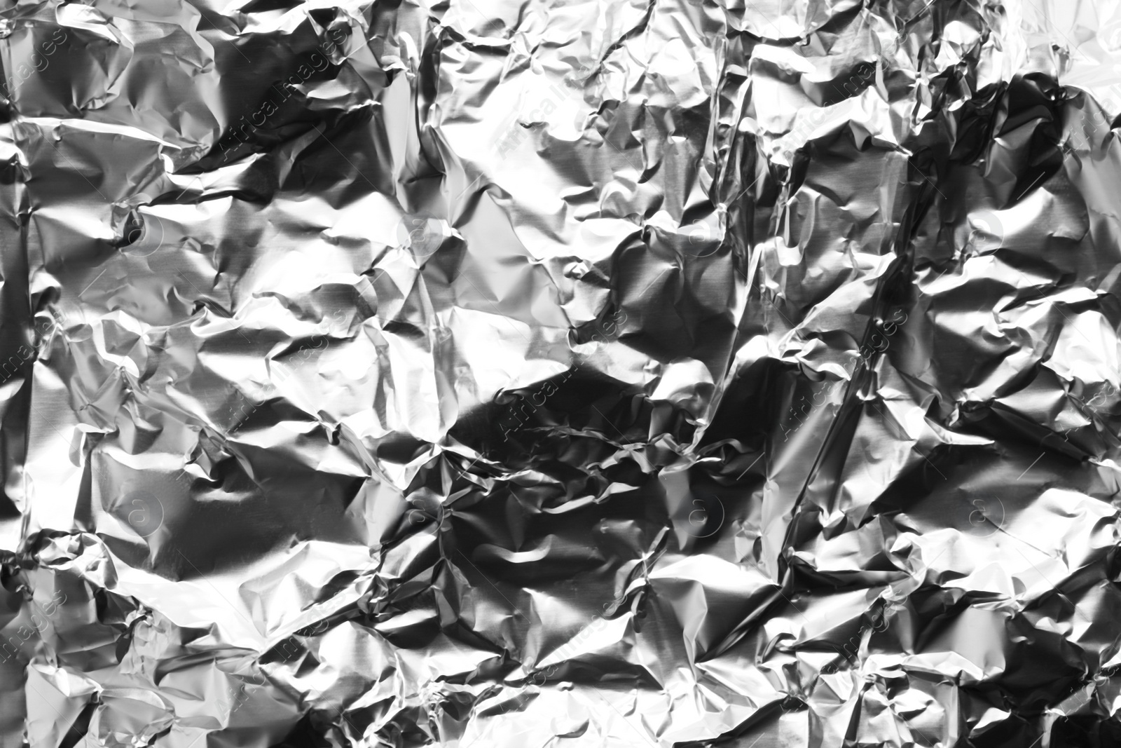 Image of Crumpled silver foil as background, top view