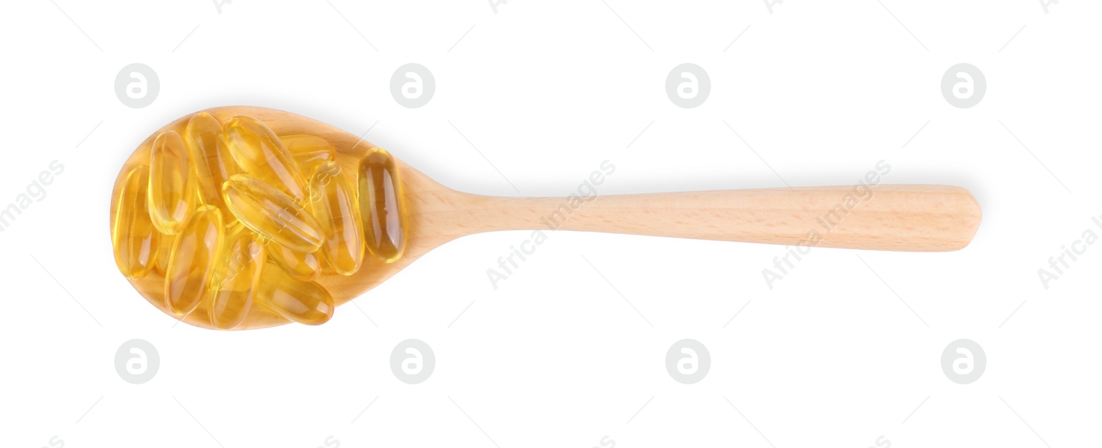 Photo of Vitamin capsules in wooden spoon isolated on white, top view