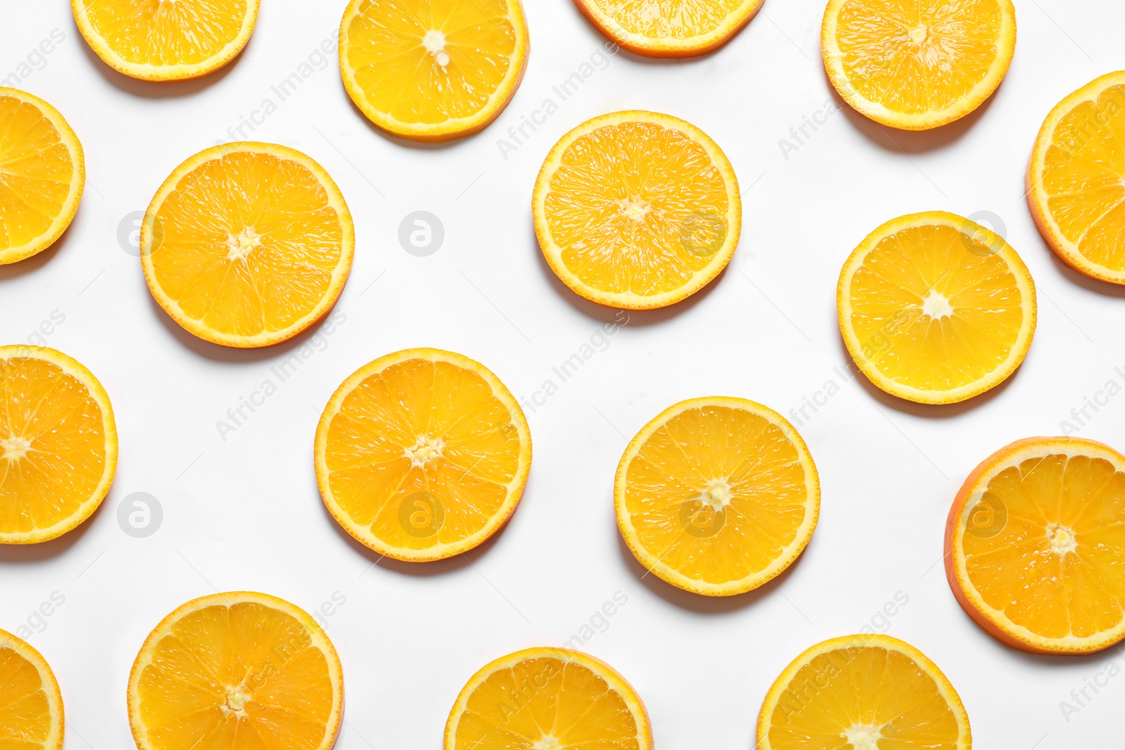 Photo of Composition with orange slices on white background, top view