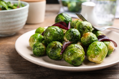 Photo of Roasted Brussels sprouts with basil on plate