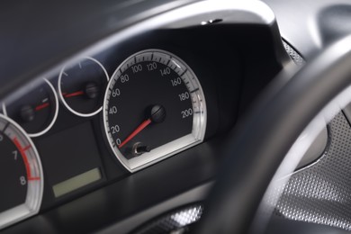 Photo of Speedometer and other indicators on car dashboard
