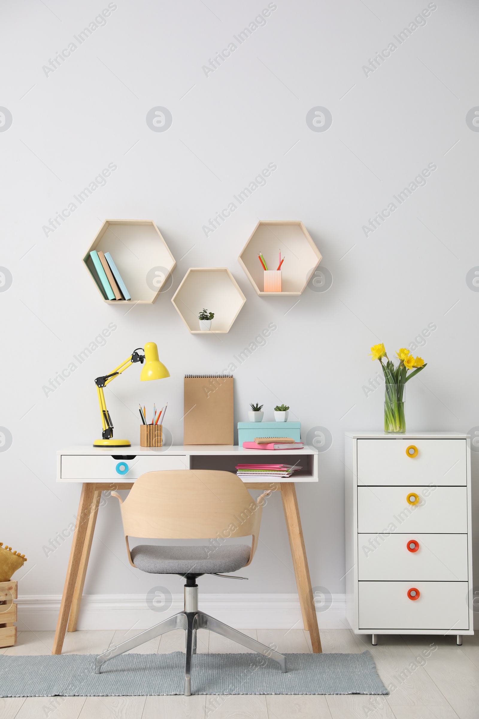 Photo of Stylish room interior with modern comfortable workplace