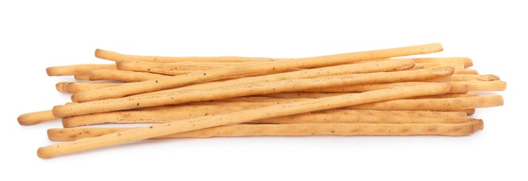 Fresh delicious grissini sticks on white background