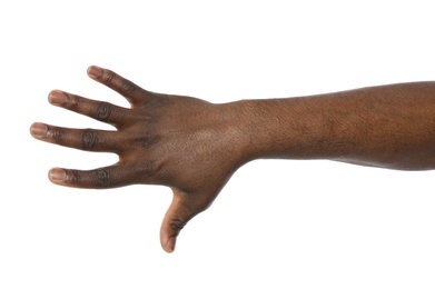 African-American man showing hand gesture on white background, closeup