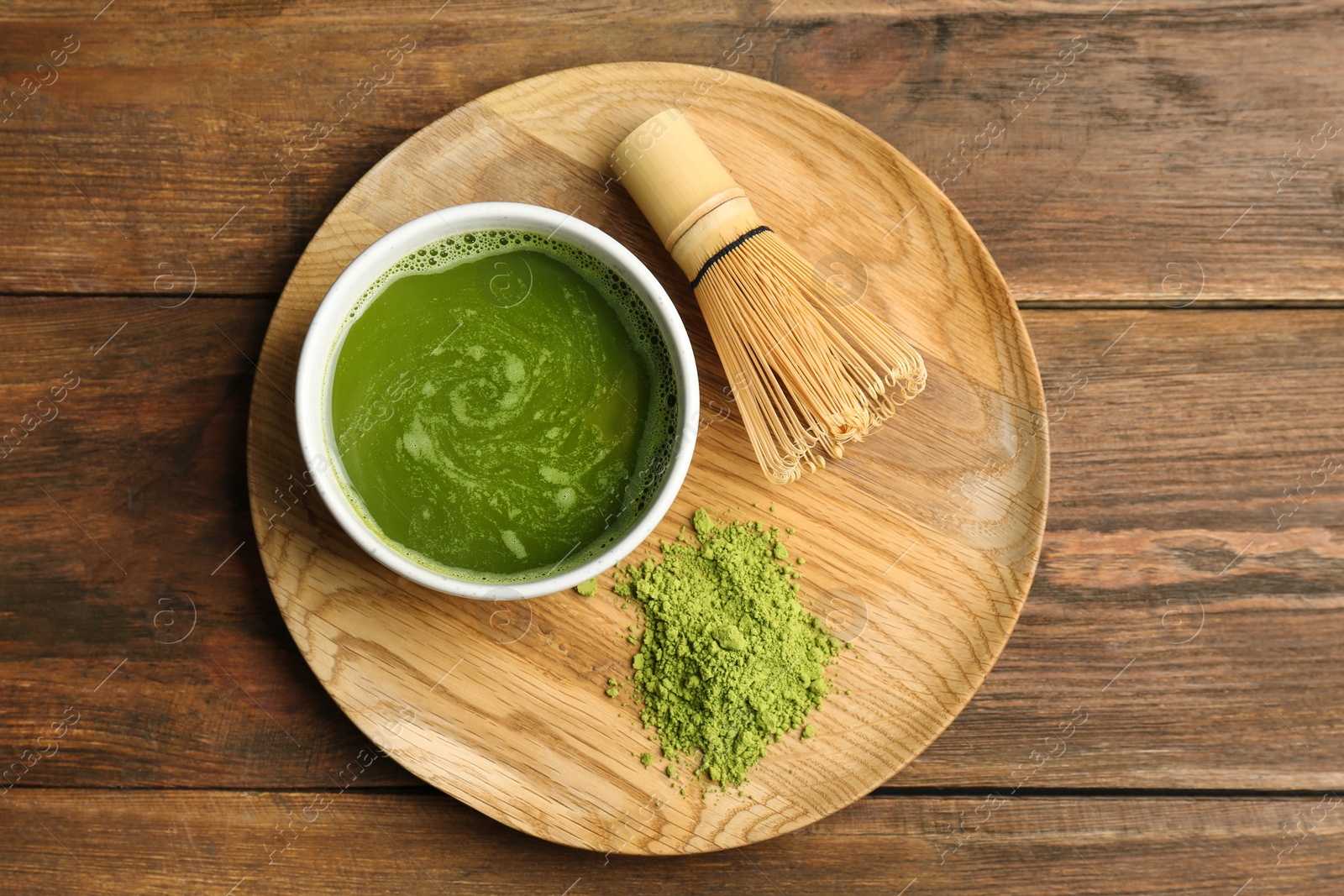 Photo of Flat lay composition with matcha tea on wooden background