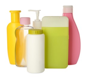 Photo of Bottles of baby cosmetic products on white background