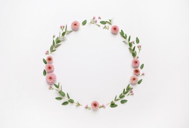 Photo of Beautiful wreath made of flowers and eucalyptus on white background, flat lay