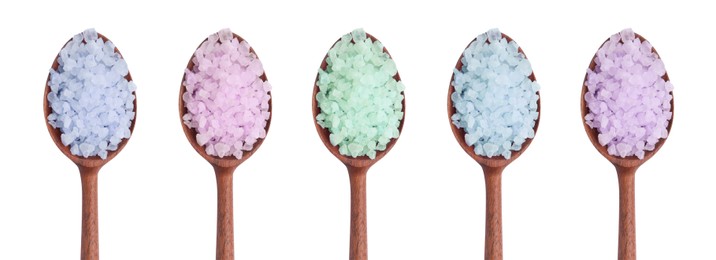 Different sea salt in spoons isolated on white, top view