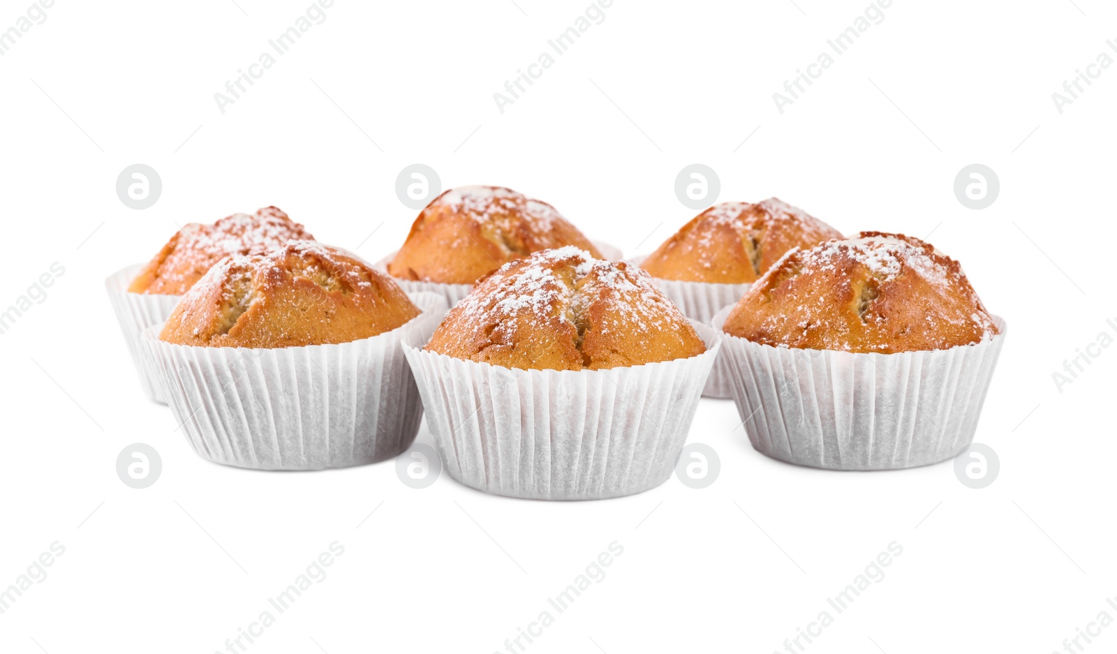 Photo of Tasty muffins powdered with sugar on white background