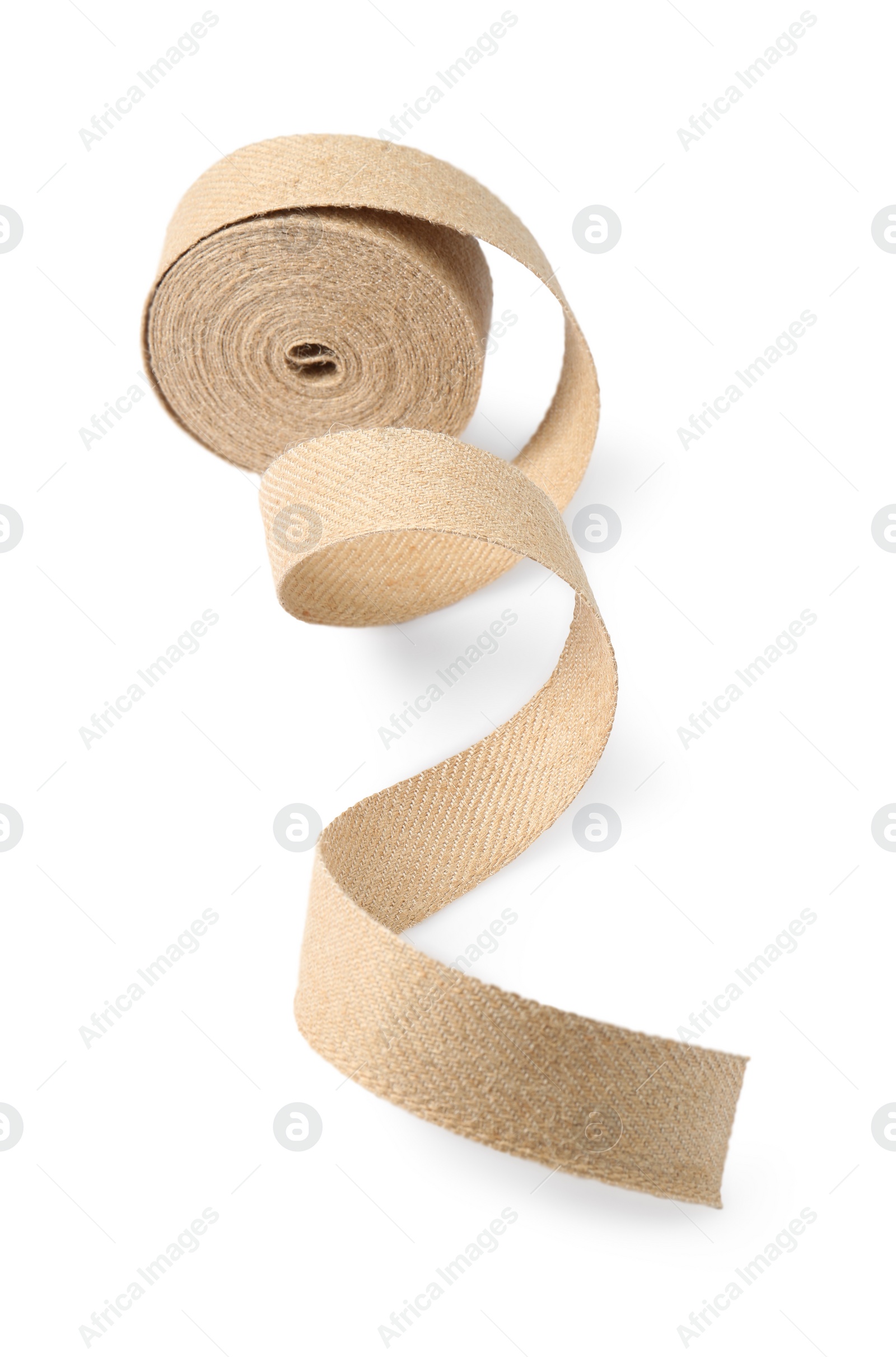 Photo of Roll of burlap ribbon isolated on white