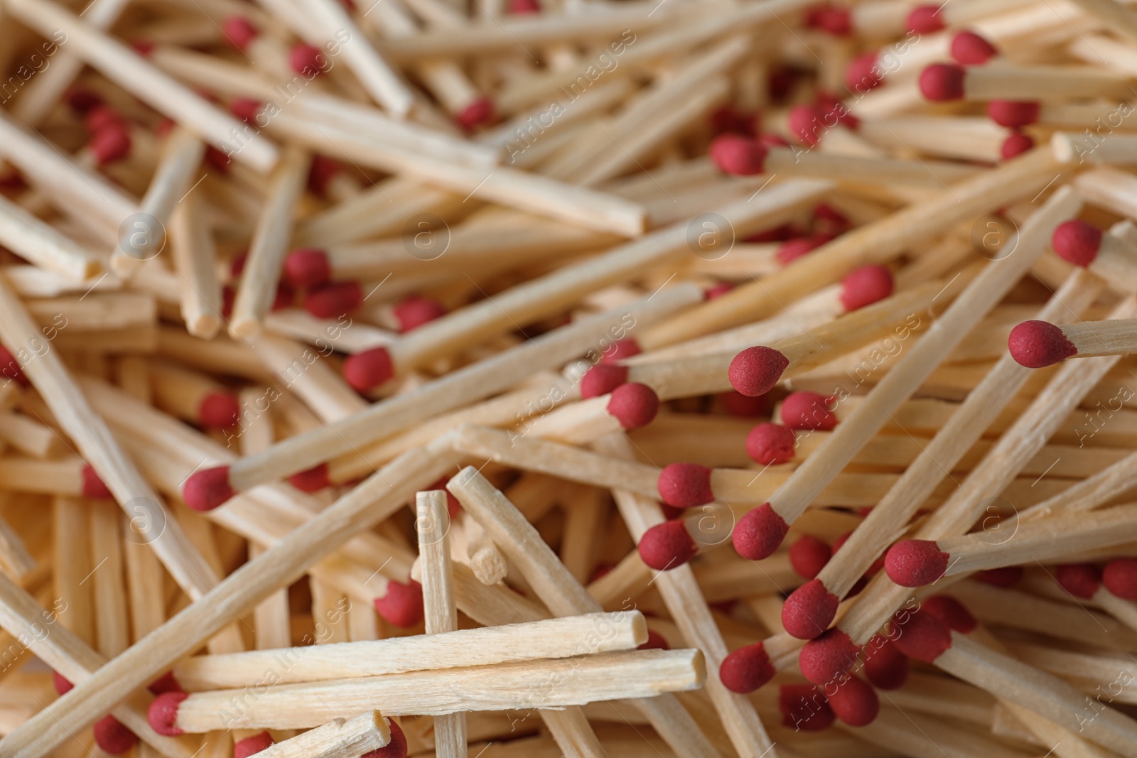 Photo of Pile of wooden matches as background, closeup