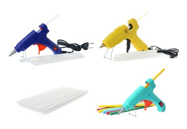 Image of Set with different glue guns with sticks on white background