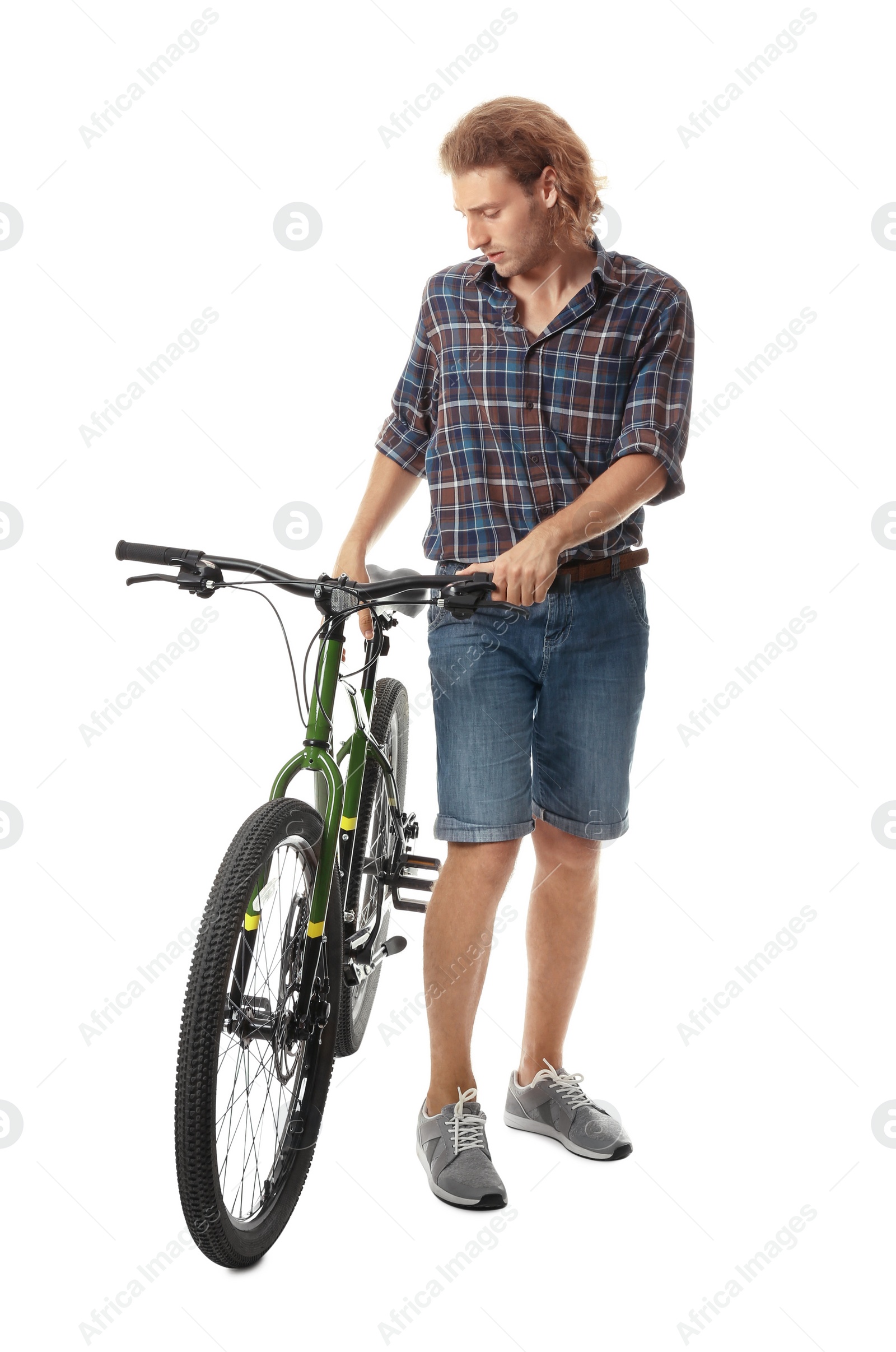 Photo of Young man with bicycle on white background