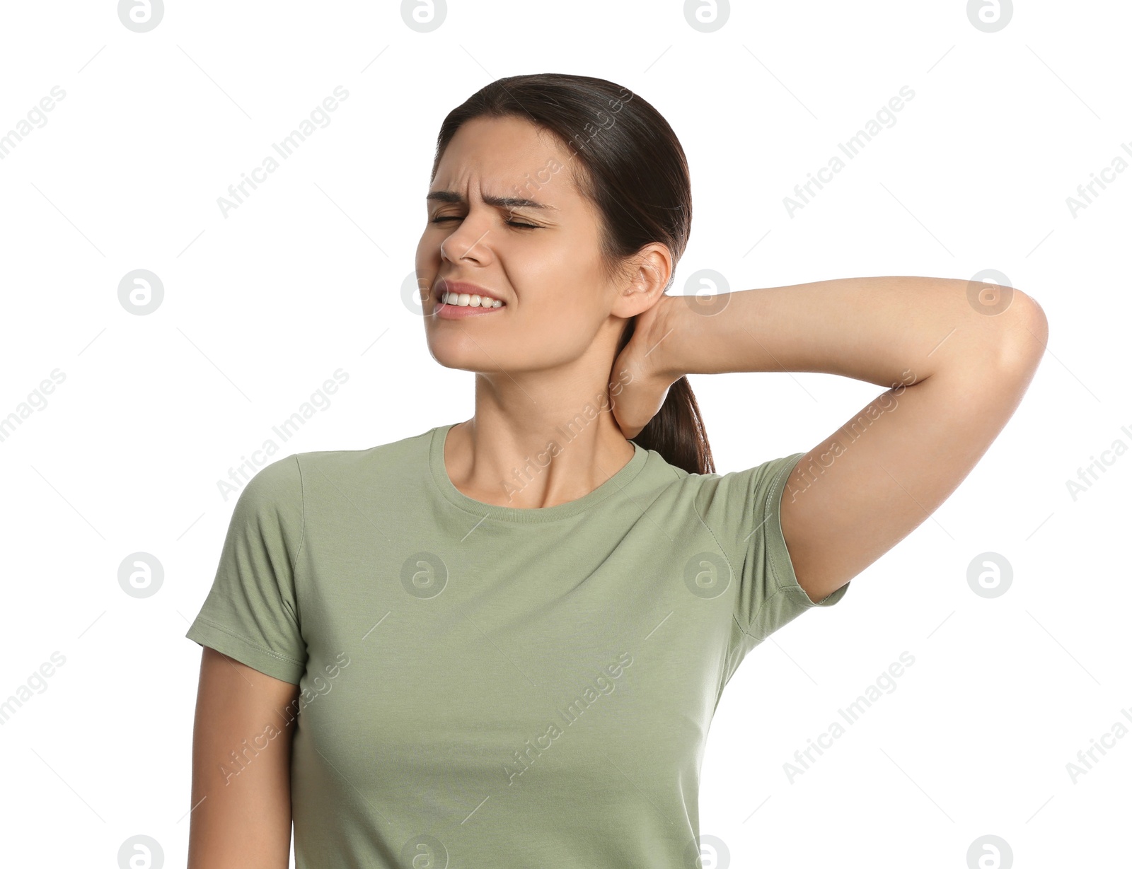 Photo of Young woman suffering from neck pain on white background