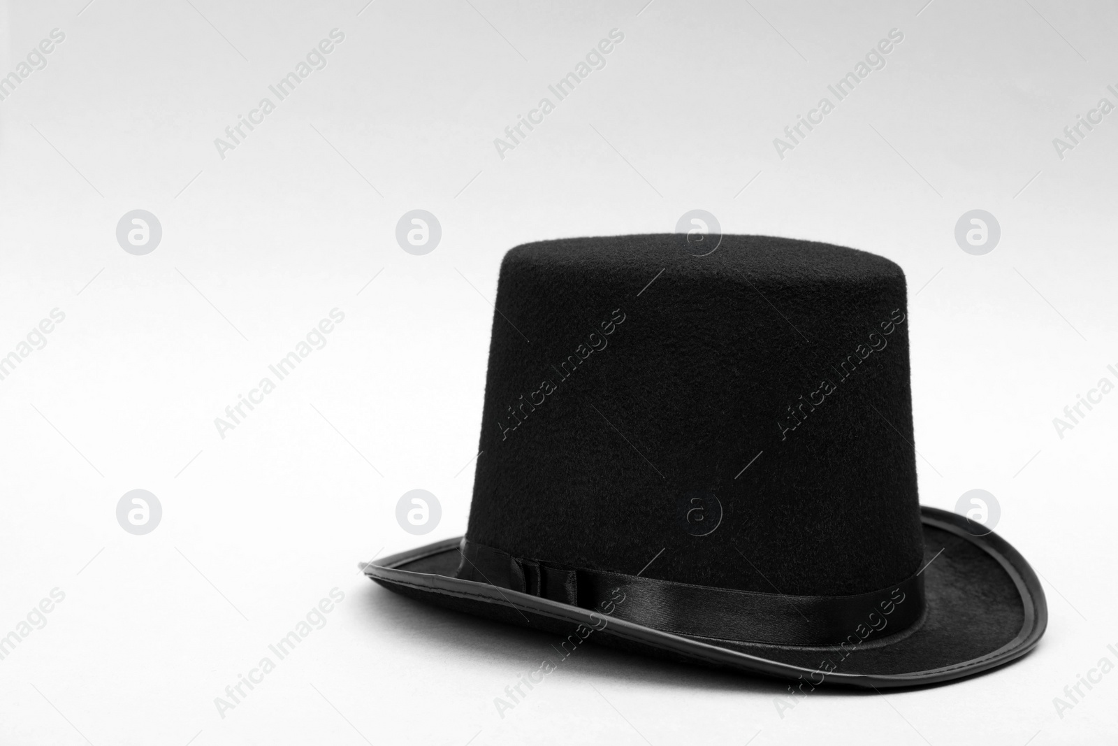 Photo of One magician top hat on white background, space for text