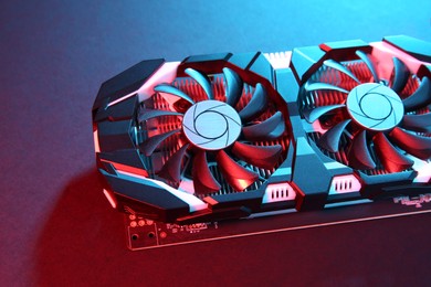 Photo of Computer graphics card on color background, closeup