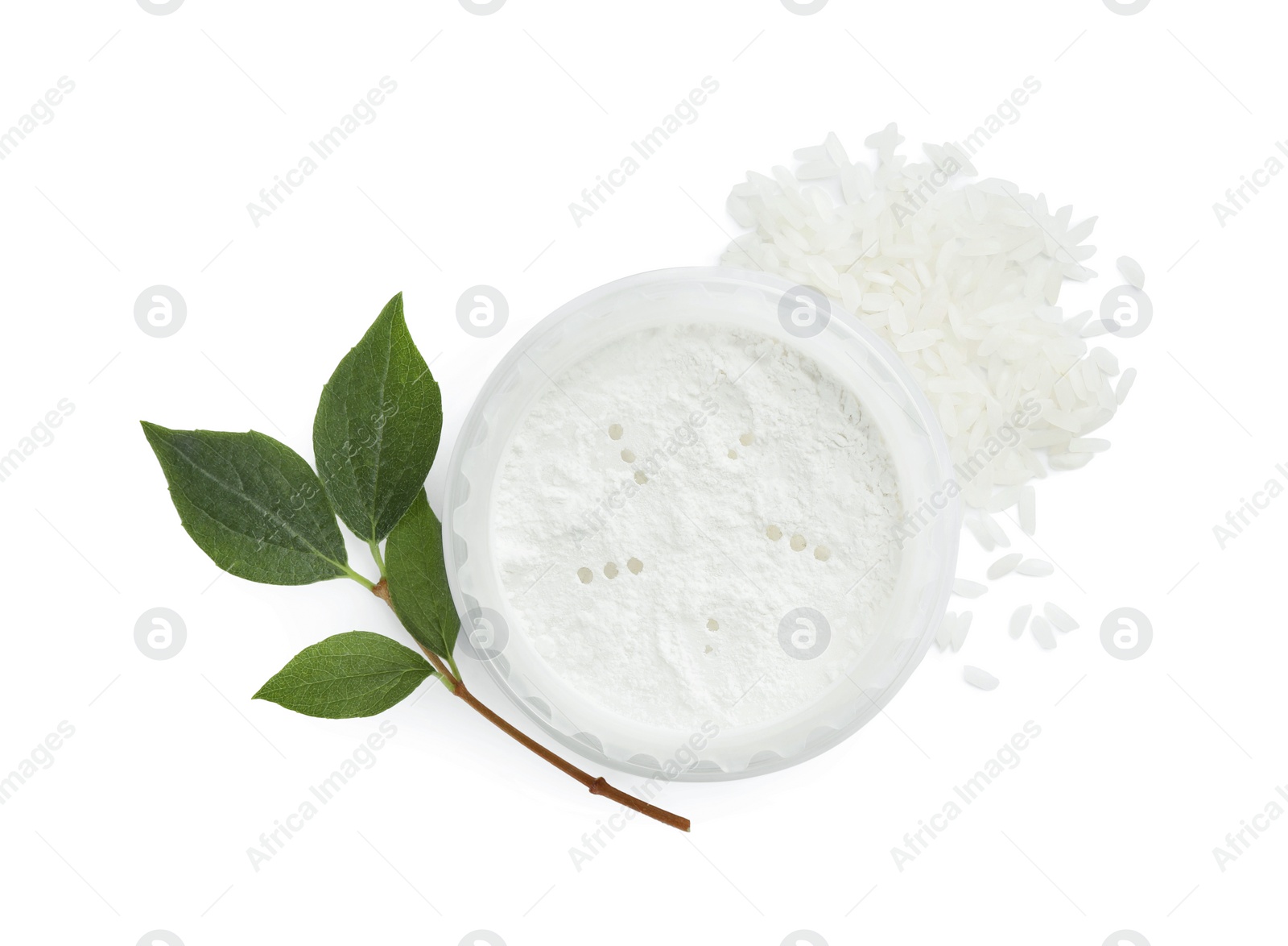 Photo of Loose face powder, rice and branch isolated on white, top view. Makeup product