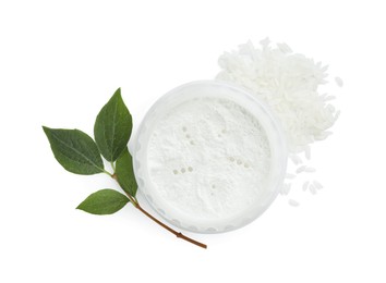 Loose face powder, rice and branch isolated on white, top view. Makeup product