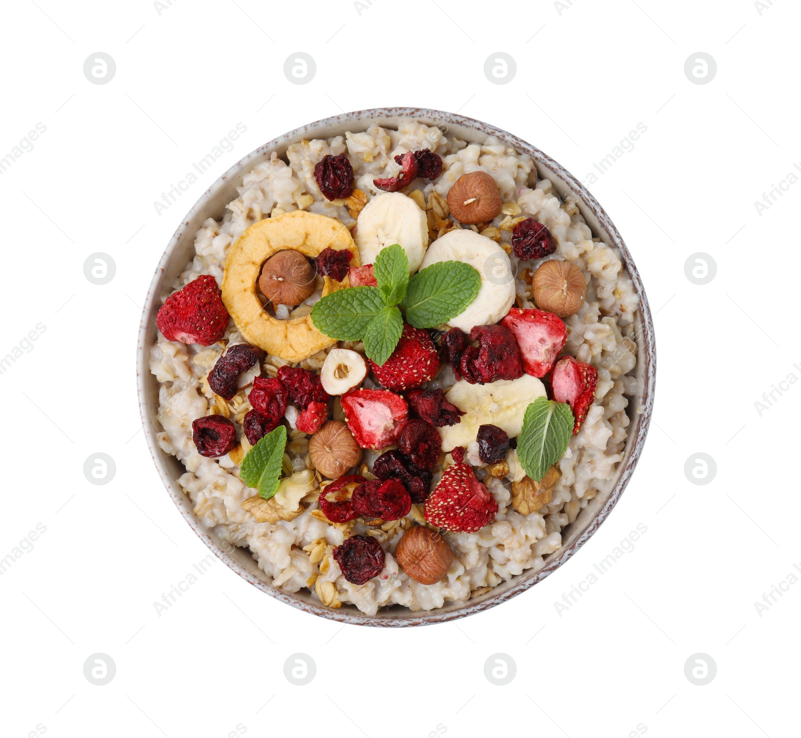 Photo of Oatmeal with freeze dried fruits, nuts and mint isolated on white, top view