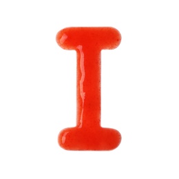 Letter I written with red sauce on white background