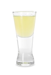 Shot glass with tasty limoncello liqueur isolated on white
