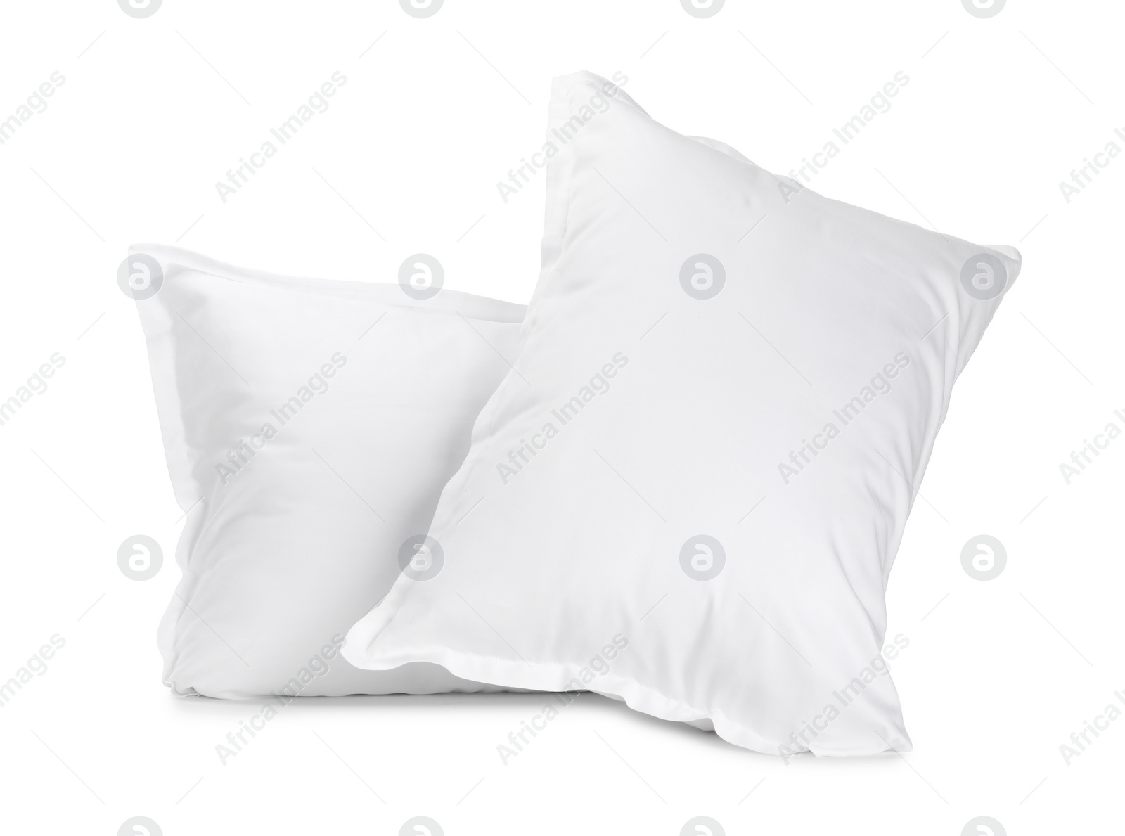 Photo of Two new soft pillows isolated on white