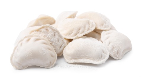 Photo of Heap of raw dumplings (varenyky) with tasty filling on white background
