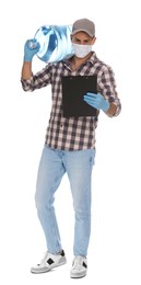 Courier in medical mask with bottle for water cooler and clipboard on white background. Delivery during coronavirus quarantine