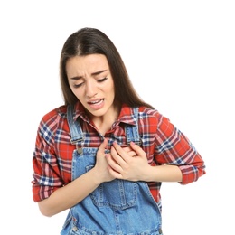 Photo of Young woman suffering from heart attack on white background