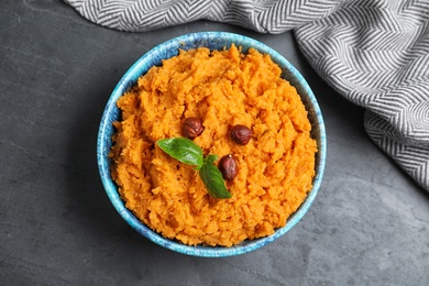 Photo of Flat lay composition with mashed sweet potatoes on grey background