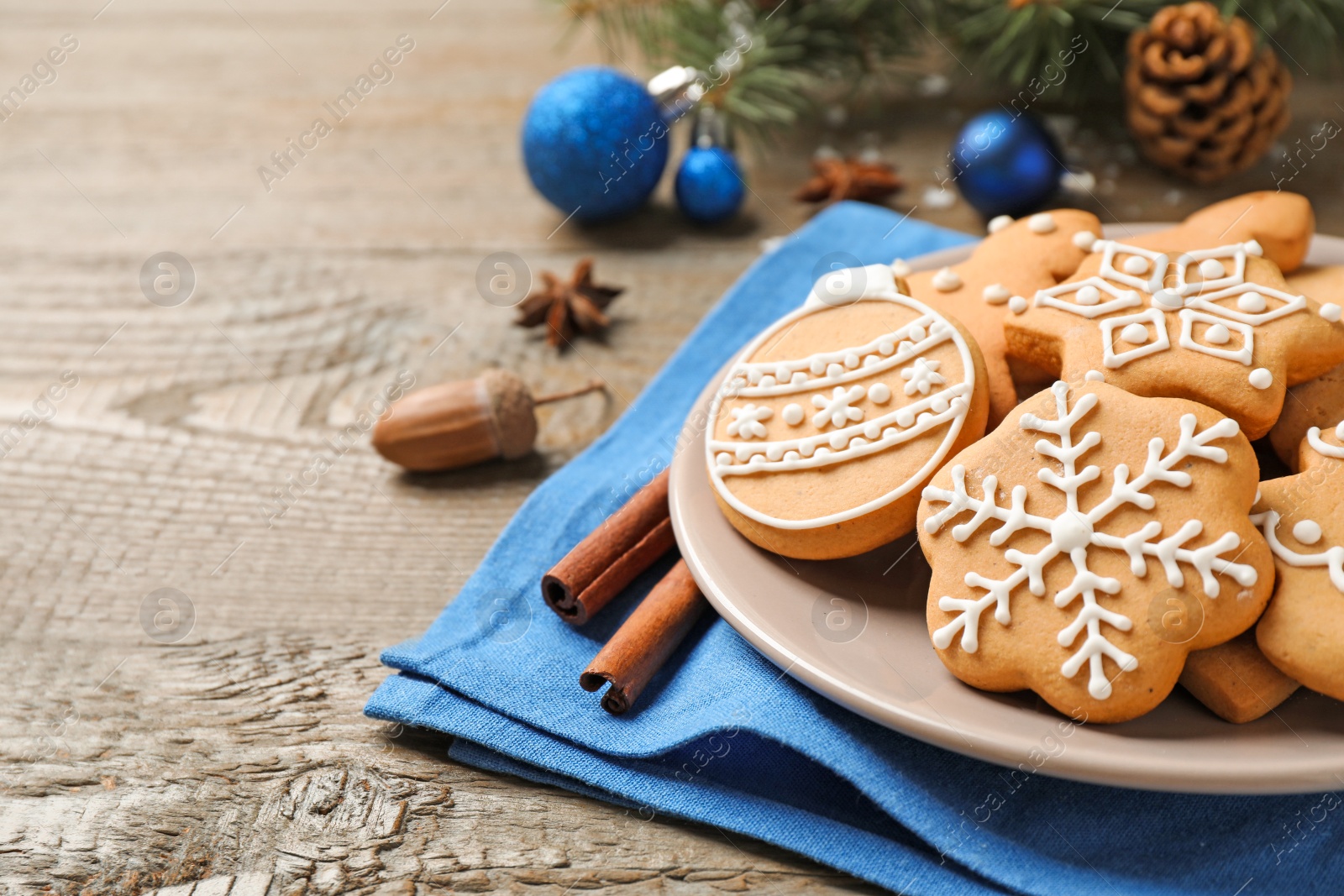 Photo of Tasty homemade Christmas cookies on wooden table