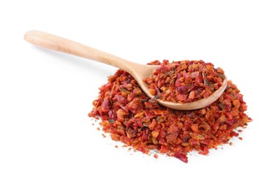 Photo of Aromatic spice. Red chili pepper flakes and spoon isolated on white