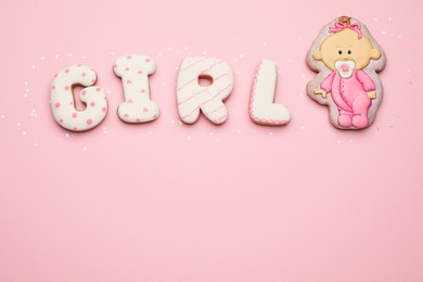 Word GIRL made of tasty cookies on pink background, flat lay with space for text. Baby shower party