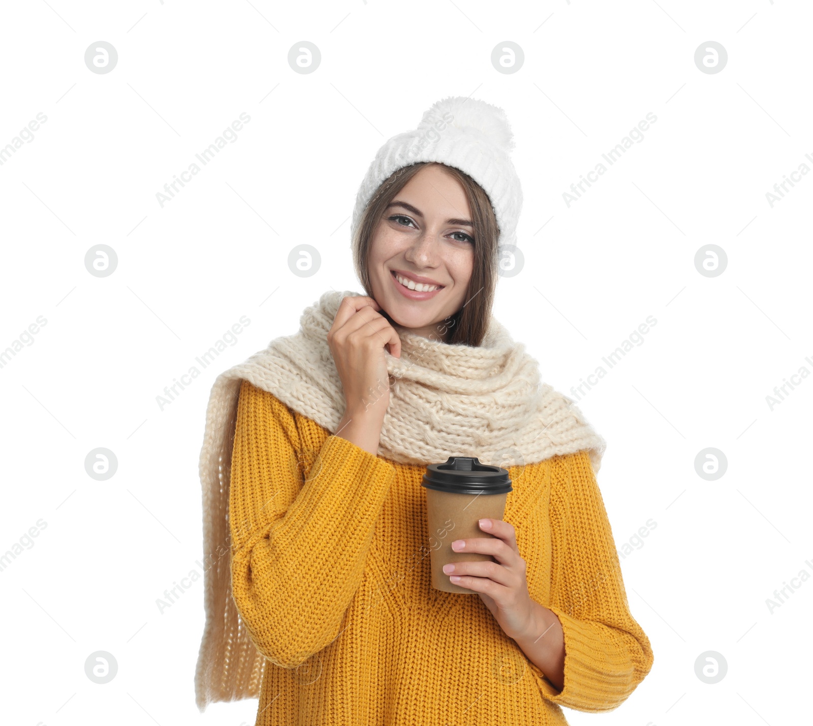 Photo of Happy beautiful woman with paper cup of mulled wine on white background