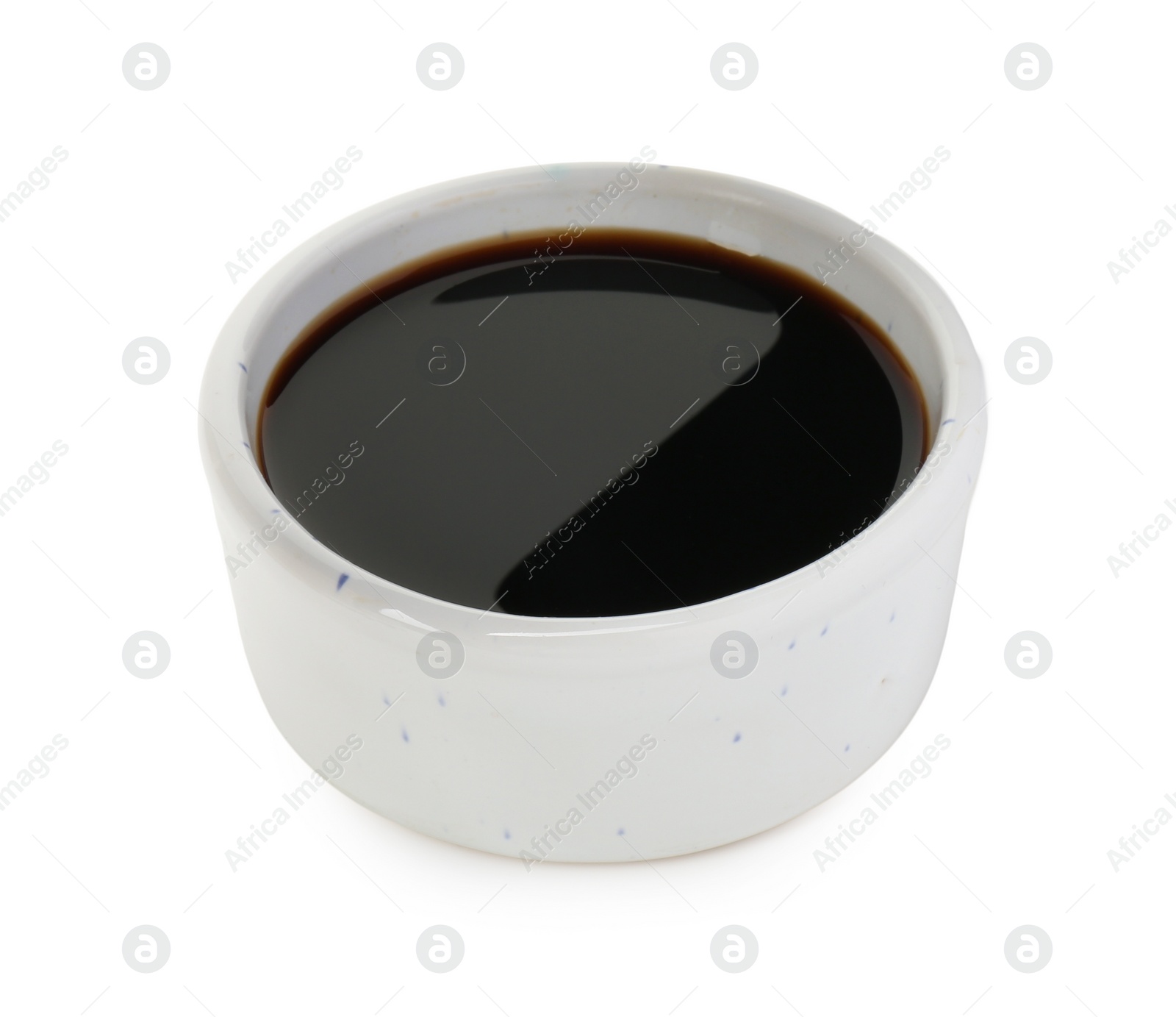 Photo of Tasty soy sauce in bowl isolated on white