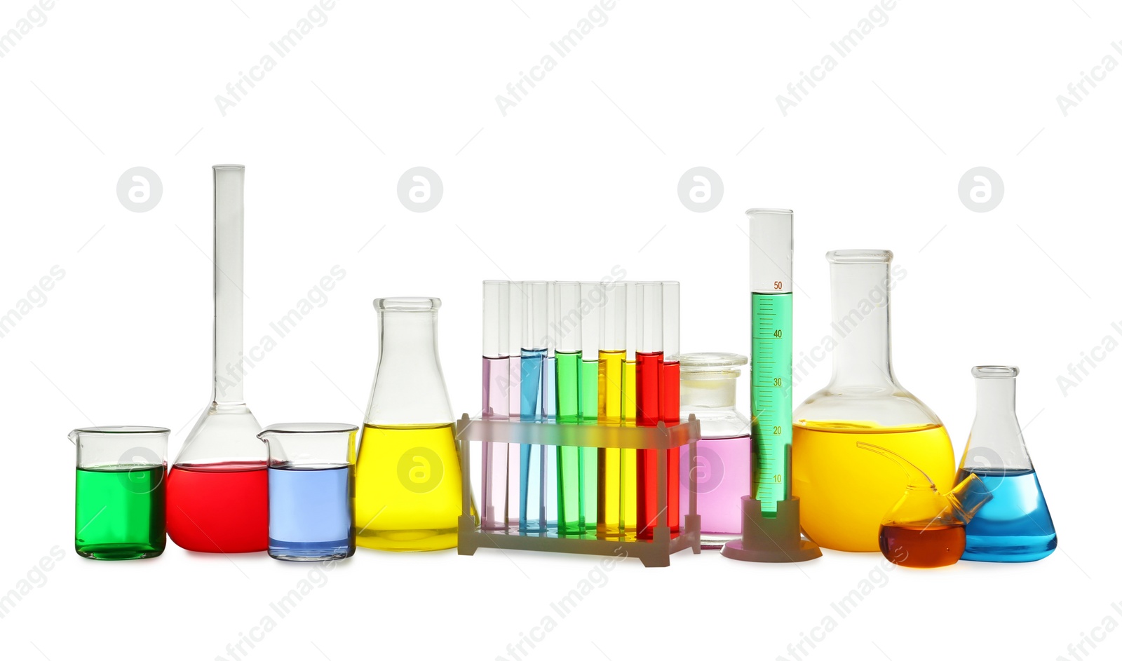 Photo of Laboratory glassware with colorful liquids on white background