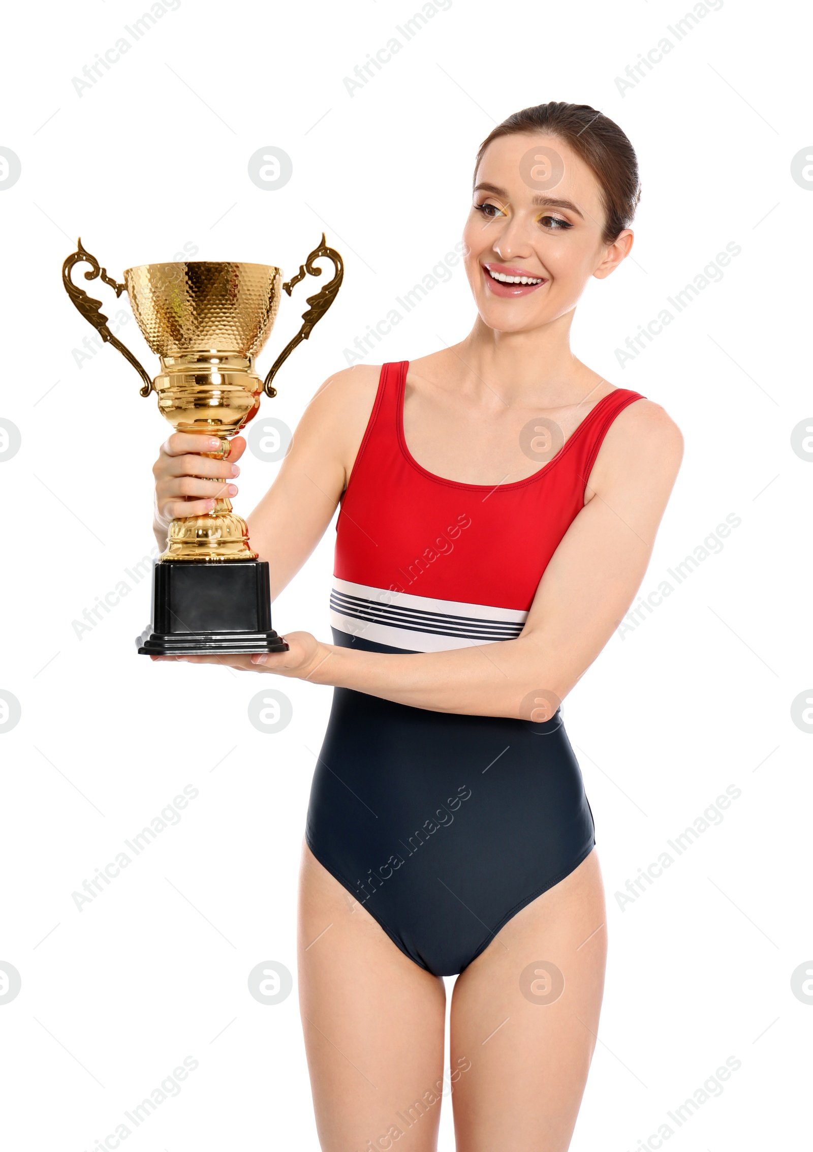 Photo of Young woman in swimwear holding golden cup on white background