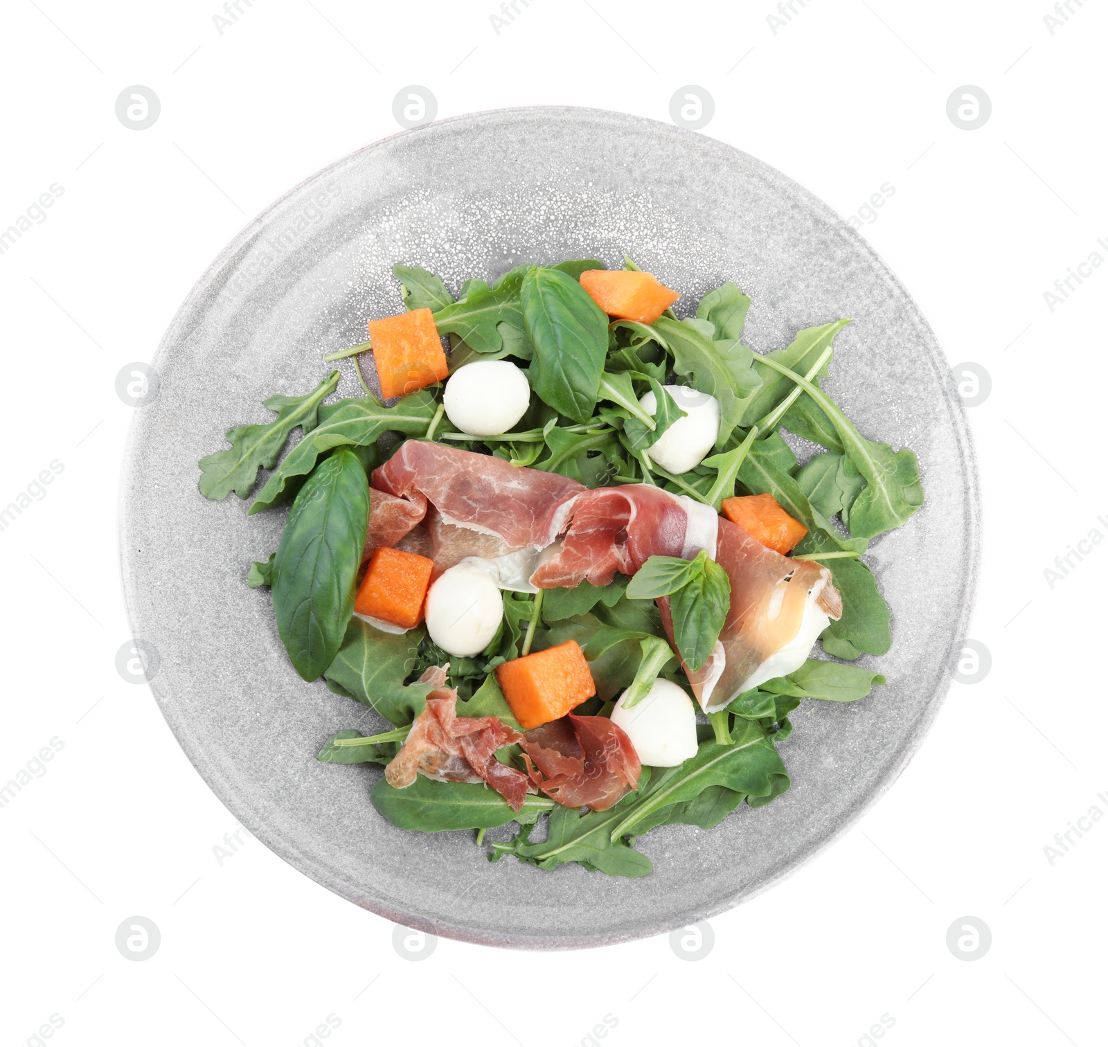 Photo of Fresh melon with prosciutto, mozzarella and arugula on white background, top view