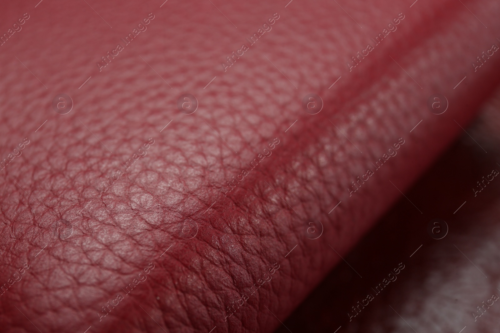 Photo of Beautiful red leather as background, closeup view